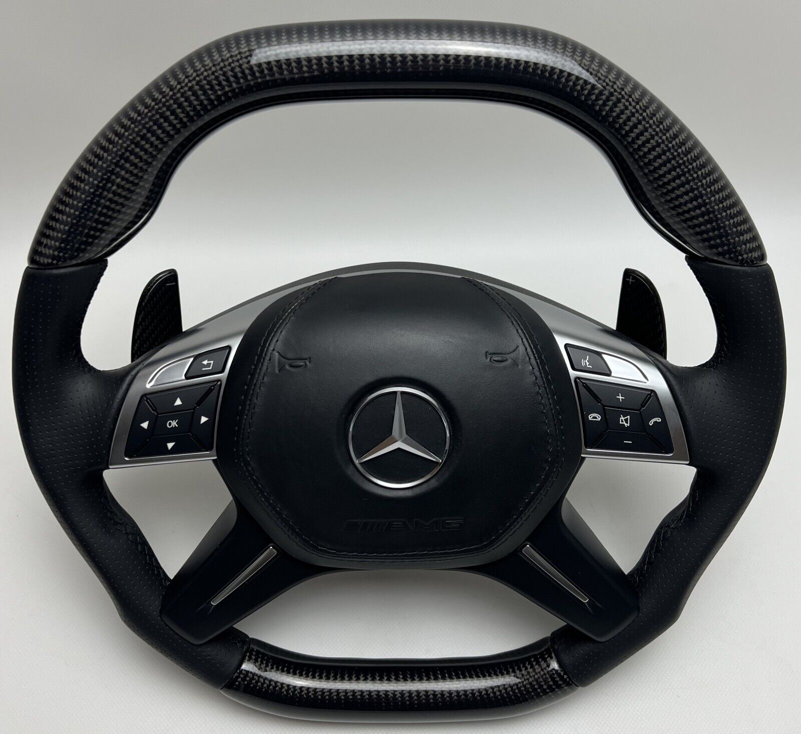 https://www.autoparts63.de/wp-content/uploads/imported/9/Mercedes-AMG-Sportpaket-Carbon-paddle-Lenkrad-G-ML-GL-klasse-W463-W-X-166-NEW-266068162429-4.jpg